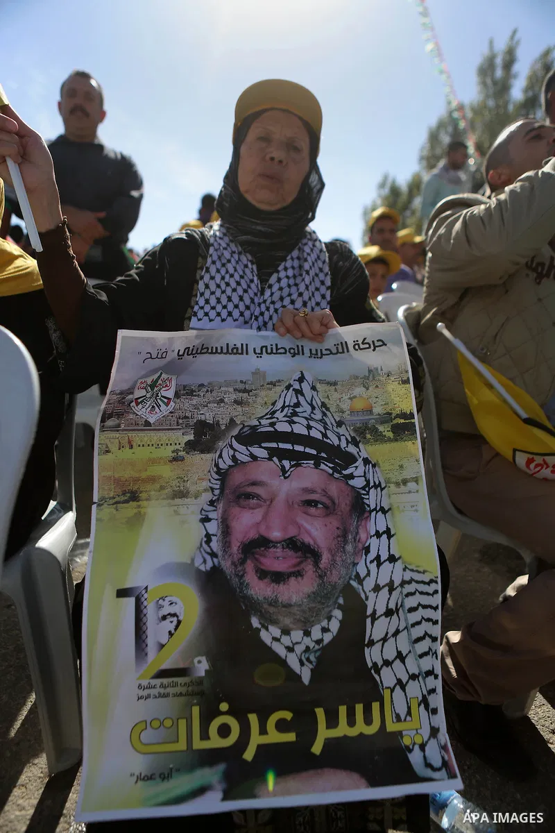 Palestinians take part in a rally marking the 12th anniversary of Palestinian leader Yasser Arafat's death, in the West Bank city of Ramallah November 10, 2016. Photo by Shadi Hatem