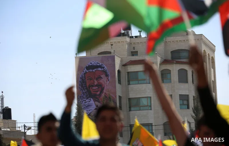 Palestinians take part in a rally marking the 12th anniversary of Palestinian leader Yasser Arafat's death, in the West Bank city of Ramallah November 10, 2016. Photo by Shadi Hatem