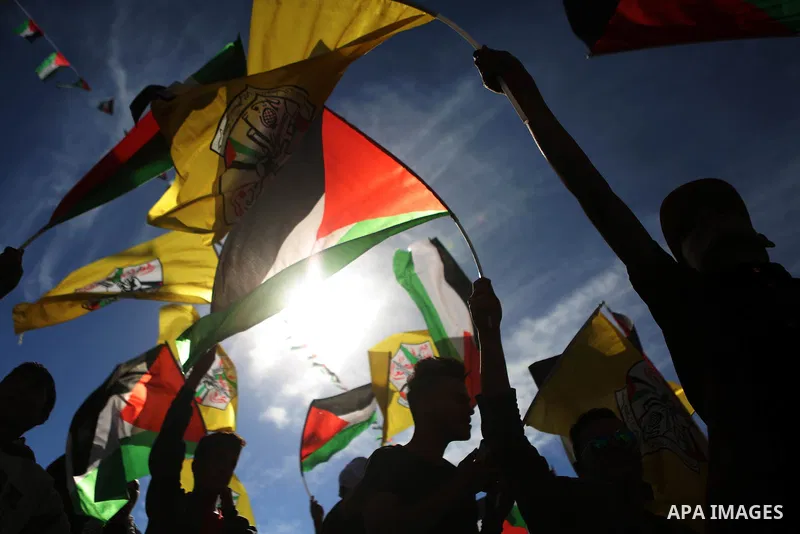 Palestinians take part in a rally marking the 12th anniversary of Palestinian leader Yasser Arafat's death, in the West Bank city of Ramallah November 10, 2016. Photo by Shadi Hatem