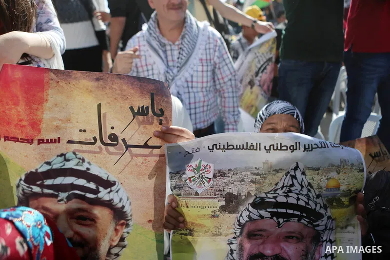 Palestinians take part in a rally marking the 12th anniversary of Palestinian leader Yasser Arafat's death, in the West Bank city of Ramallah November 10, 2016. Photo by Shadi Hatem