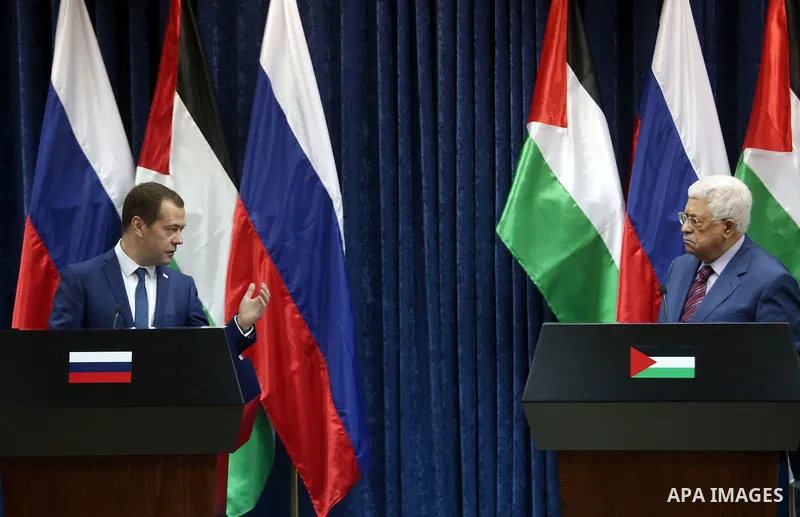 Palestinian President Mahmoud Abbas and Russian Prime Minister Dmitry Medvedev attend a joint news conference in the West Bank city of Jericho November 11, 2016. Photo by Shadi Hatem