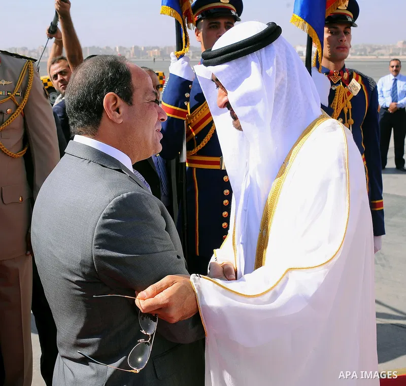 Egyptian President Abdel Fattah al-Sisi welcomes Sheikh Mohammed bin Zayed Al Nahyan Crown Prince of Abu Dhabi Deputy Supreme Commander of the UAE Armed Forces upon his arrival at Cairo's international airport in Cairo,...