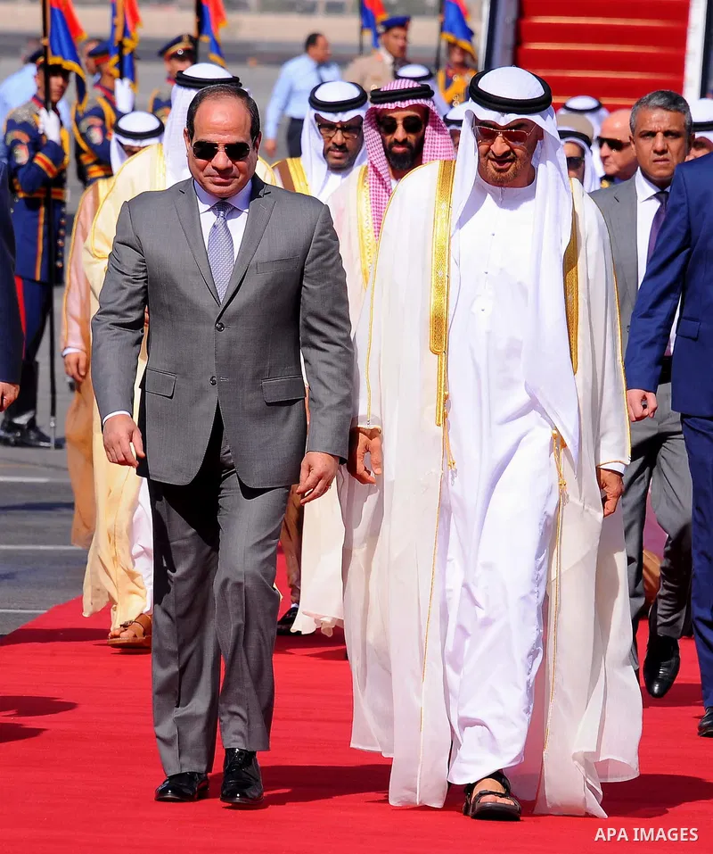 Egyptian President Abdel Fattah al-Sisi welcomes Sheikh Mohammed bin Zayed Al Nahyan Crown Prince of Abu Dhabi Deputy Supreme Commander of the UAE Armed Forces upon his arrival at Cairo's international airport in Cairo,...