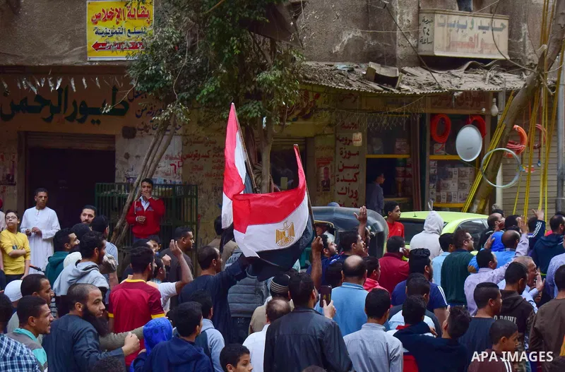 Egyptian supporters of ousted Islamist president Mohammed Morsi and the Muslim Brotherhood, march shouting slogans against the President Abdel Fattah al-Sisi and the military rule in al-Haram neighbourhood in the souther...