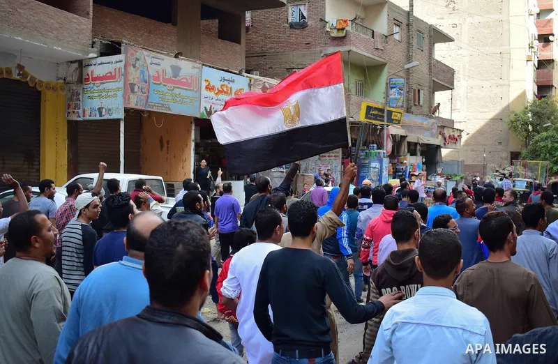 Egyptian supporters of ousted Islamist president Mohammed Morsi and the Muslim Brotherhood, march shouting slogans against the President Abdel Fattah al-Sisi and the military rule in al-Haram neighbourhood in the souther...