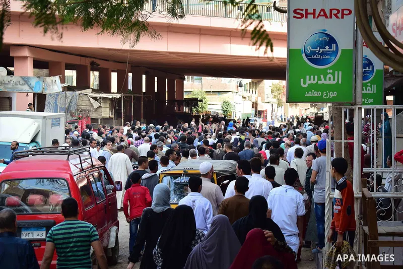 Egyptian supporters of ousted Islamist president Mohammed Morsi and the Muslim Brotherhood, march shouting slogans against the President Abdel Fattah al-Sisi and the military rule in al-Haram neighbourhood in the souther...