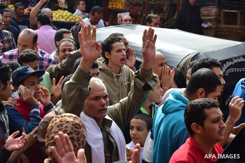 Egyptian supporters of ousted Islamist president Mohammed Morsi and the Muslim Brotherhood, march shouting slogans against the President Abdel Fattah al-Sisi and the military rule in al-Haram neighbourhood in the souther...