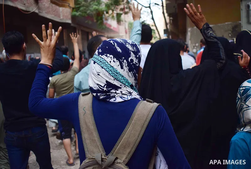 Egyptian supporters of ousted Islamist president Mohammed Morsi and the Muslim Brotherhood, march shouting slogans against the President Abdel Fattah al-Sisi and the military rule in al-Haram neighbourhood in the souther...