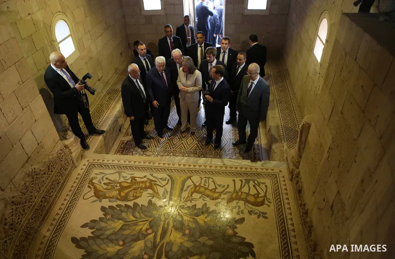 Palestinian President Mahmoud Abbas and Russian Prime Minister Dmitry Medvedev visit the Hisham's Palace archaeological site on November 11, 2016 five kilometres north of the West Bank city of Jericho.. Photo by Shadi Ha...