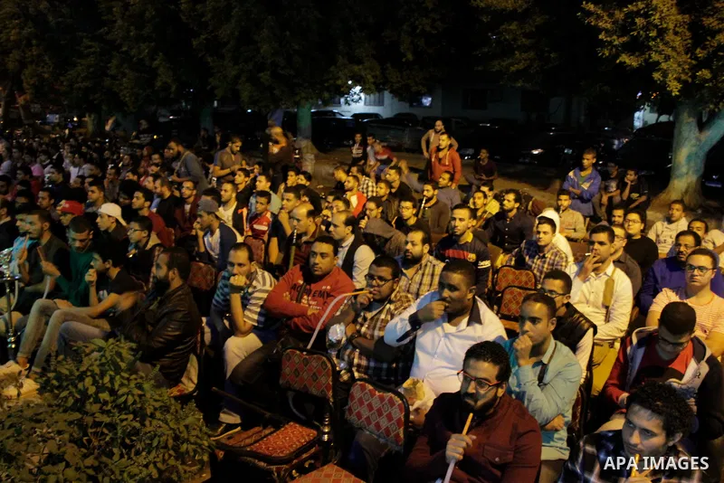 Egyptian fans watch the televised the 2018 World Cup qualifying Group E football match between Egypt and Ghana, in Cairo, Egypt on November 13, 2016. Photo by Stringer