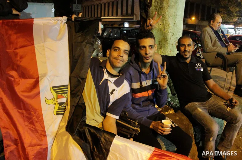 Egyptian fans watch the televised the 2018 World Cup qualifying Group E football match between Egypt and Ghana, in Cairo, Egypt on November 13, 2016. Photo by Stringer