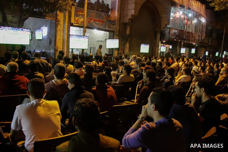 Egyptian fans watch the televised the 2018 World Cup qualifying Group E football match between Egypt and Ghana, in Cairo, Egypt on November 13, 2016. Photo by Stringer