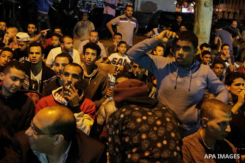 Egyptian fans watch the televised the 2018 World Cup qualifying Group E football match between Egypt and Ghana, in Cairo, Egypt on November 13, 2016. Photo by Stringer