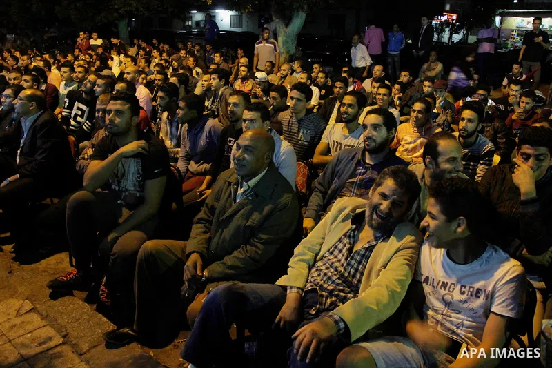 Egyptian fans watch the televised the 2018 World Cup qualifying Group E football match between Egypt and Ghana, in Cairo, Egypt on November 13, 2016. Photo by Stringer
