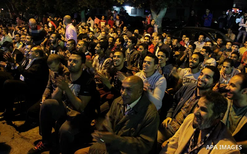 Egyptian fans watch the televised the 2018 World Cup qualifying Group E football match between Egypt and Ghana, in Cairo, Egypt on November 13, 2016. Photo by Stringer