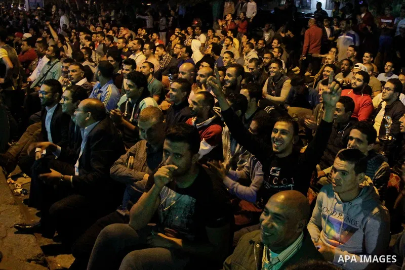 Egyptian fans watch the televised the 2018 World Cup qualifying Group E football match between Egypt and Ghana, in Cairo, Egypt on November 13, 2016. Photo by Stringer