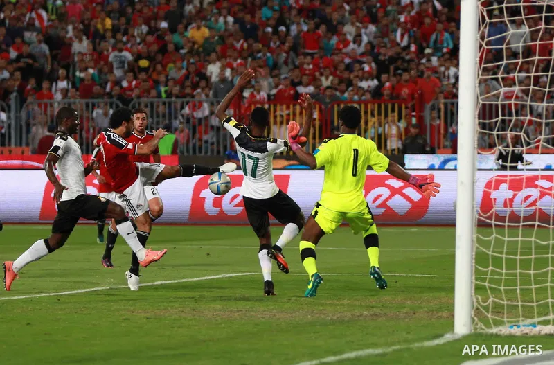 Egypt v Ghana compete during the 2018 World Cup qualifying Group E football match between Egypt and Ghana at the Borg el-Arab Stadium near Alexandria on November 13, 2016. Photo by Stringer