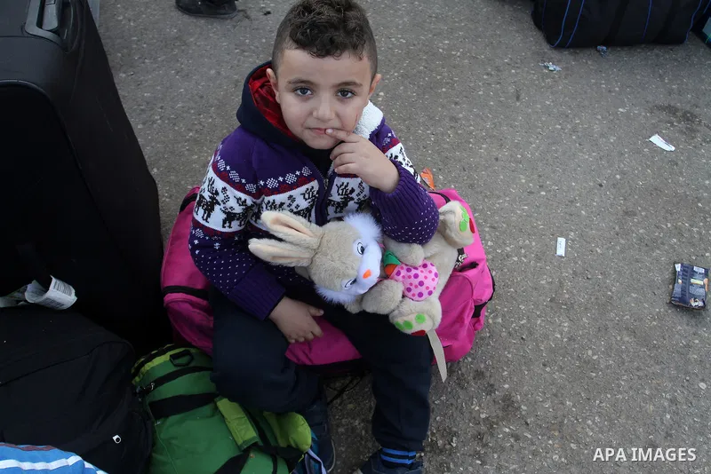 Palestinians wait permission to enter Egypt as they gather at the Rafah border crossing in the southern Gaza Strip on on November 14, 2016. Egypt is due to reopen its Rafah border crossing with Gaza for Five days. Photo...