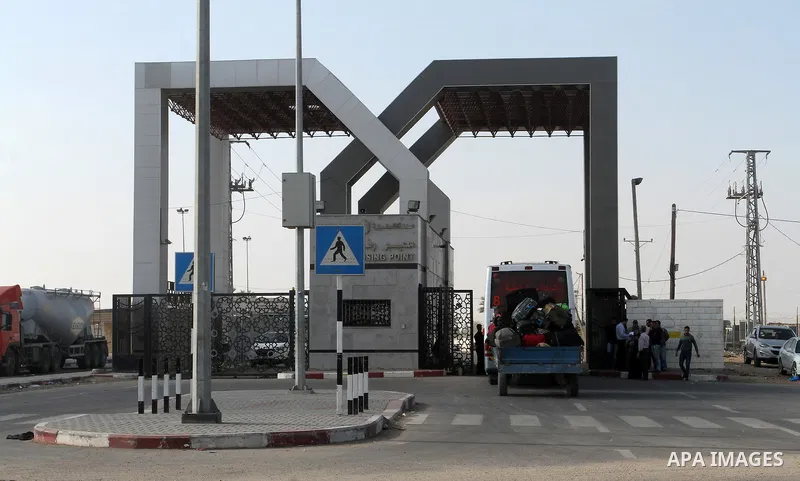 Palestinians wait permission to enter Egypt as they gather at the Rafah border crossing in the southern Gaza Strip on on November 14, 2016. Egypt is due to reopen its Rafah border crossing with Gaza for Five days. Photo...