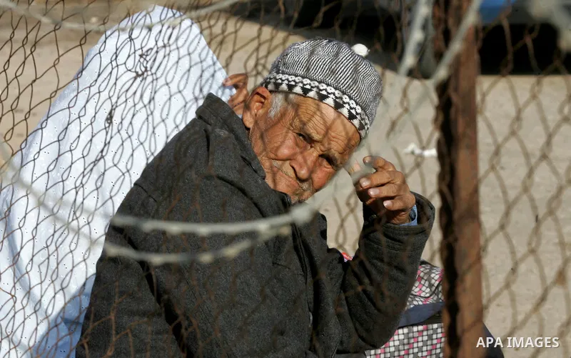 Palestinians wait permission to enter Egypt as they gather at the Rafah border crossing in the southern Gaza Strip on on November 14, 2016. Egypt is due to reopen its Rafah border crossing with Gaza for Five days. Photo...