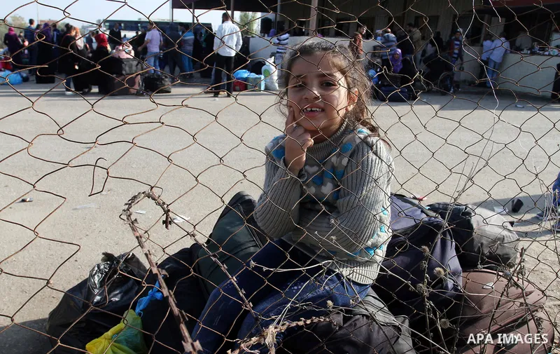 Palestinians wait permission to enter Egypt as they gather at the Rafah border crossing in the southern Gaza Strip on on November 14, 2016. Egypt is due to reopen its Rafah border crossing with Gaza for Five days. Photo...