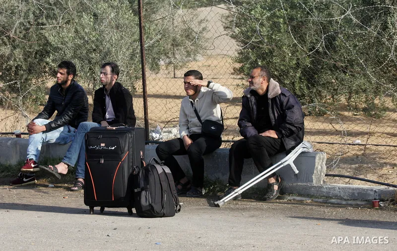 Palestinians wait permission to enter Egypt as they gather at the Rafah border crossing in the southern Gaza Strip on on November 14, 2016. Egypt is due to reopen its Rafah border crossing with Gaza for Five days. Photo...