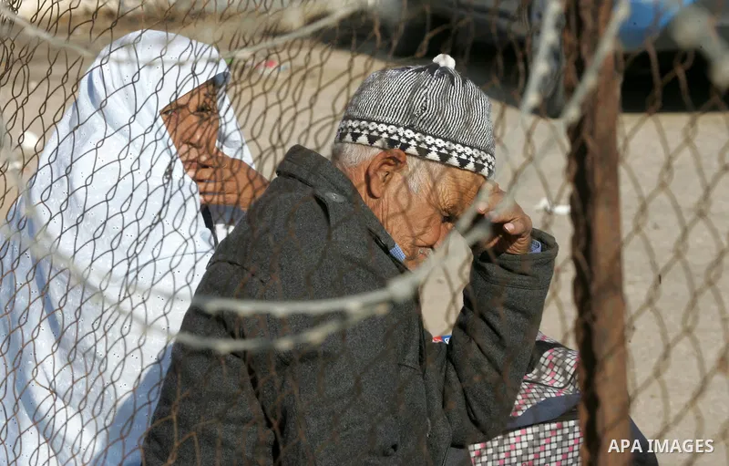 Palestinians wait permission to enter Egypt as they gather at the Rafah border crossing in the southern Gaza Strip on on November 14, 2016. Egypt is due to reopen its Rafah border crossing with Gaza for Five days. Photo...