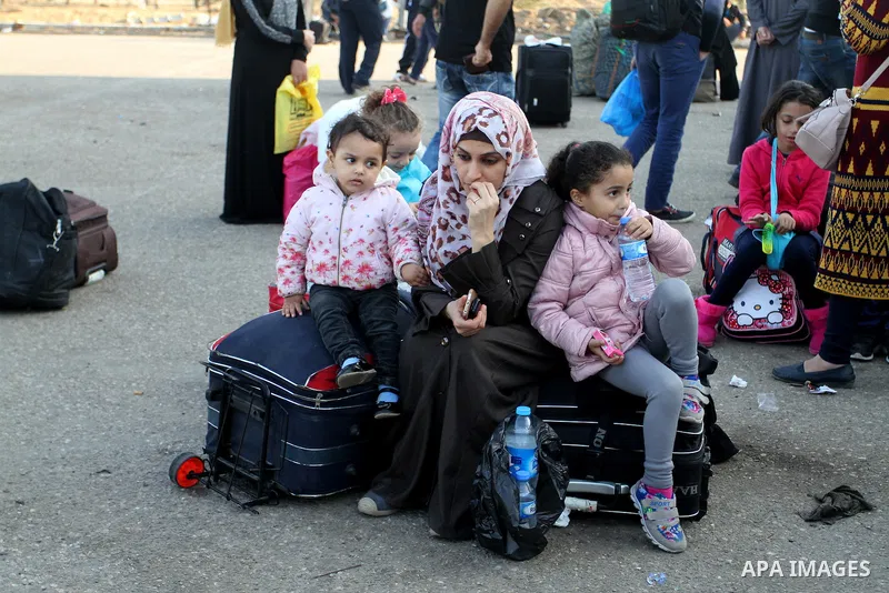 Palestinians wait permission to enter Egypt as they gather at the Rafah border crossing in the southern Gaza Strip on on November 14, 2016. Egypt is due to reopen its Rafah border crossing with Gaza for Five days. Photo...