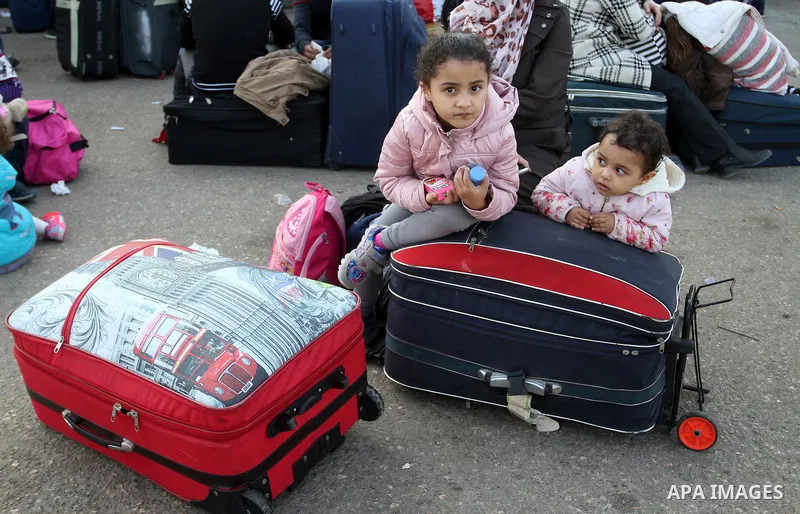 Palestinians wait permission to enter Egypt as they gather at the Rafah border crossing in the southern Gaza Strip on on November 14, 2016. Egypt is due to reopen its Rafah border crossing with Gaza for Five days. Photo...