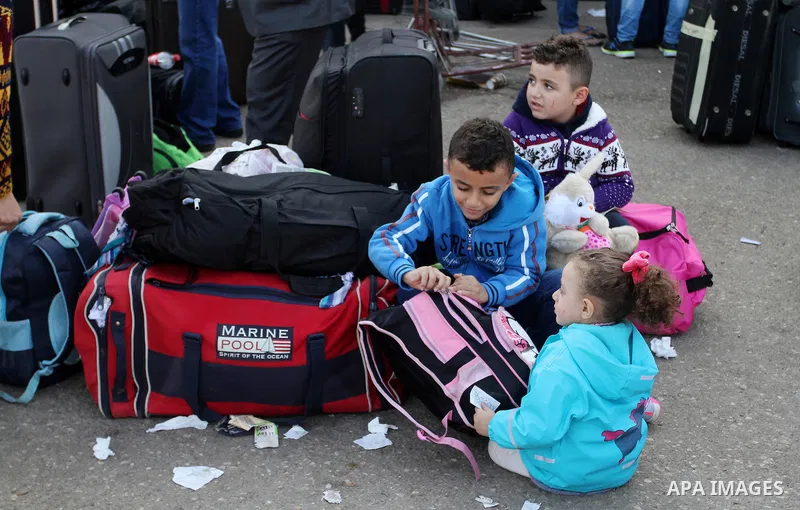Palestinians wait permission to enter Egypt as they gather at the Rafah border crossing in the southern Gaza Strip on on November 14, 2016. Egypt is due to reopen its Rafah border crossing with Gaza for Five days. Photo...