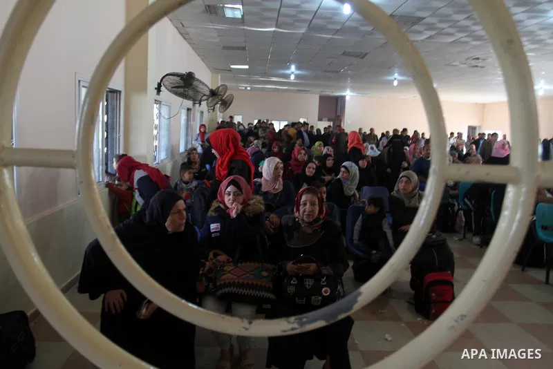 Palestinians wait permission to enter Egypt as they gather at the Rafah border crossing in the southern Gaza Strip on on November 14, 2016. Egypt is due to reopen its Rafah border crossing with Gaza for Five days. Photo...