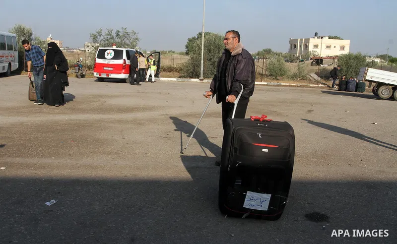 Palestinians wait permission to enter Egypt as they gather at the Rafah border crossing in the southern Gaza Strip on on November 14, 2016. Egypt is due to reopen its Rafah border crossing with Gaza for Five days. Photo...