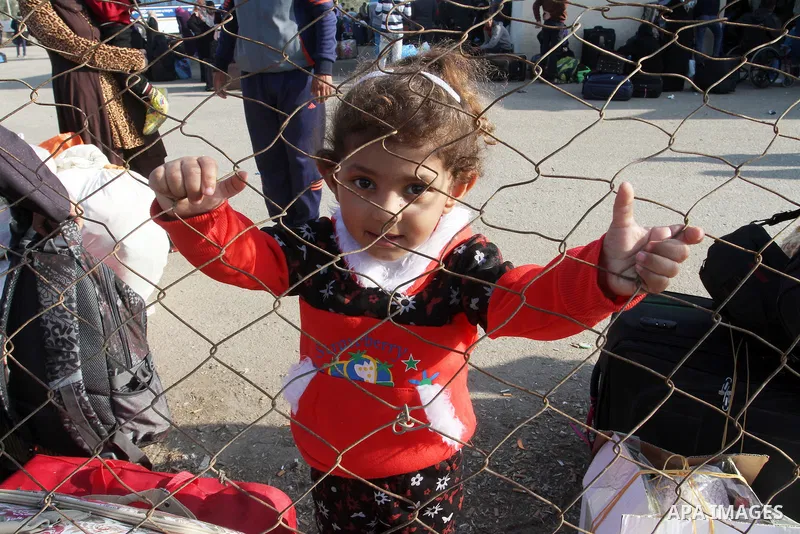 Palestinians wait permission to enter Egypt as they gather at the Rafah border crossing in the southern Gaza Strip on on November 14, 2016. Egypt is due to reopen its Rafah border crossing with Gaza for Five days. Photo...
