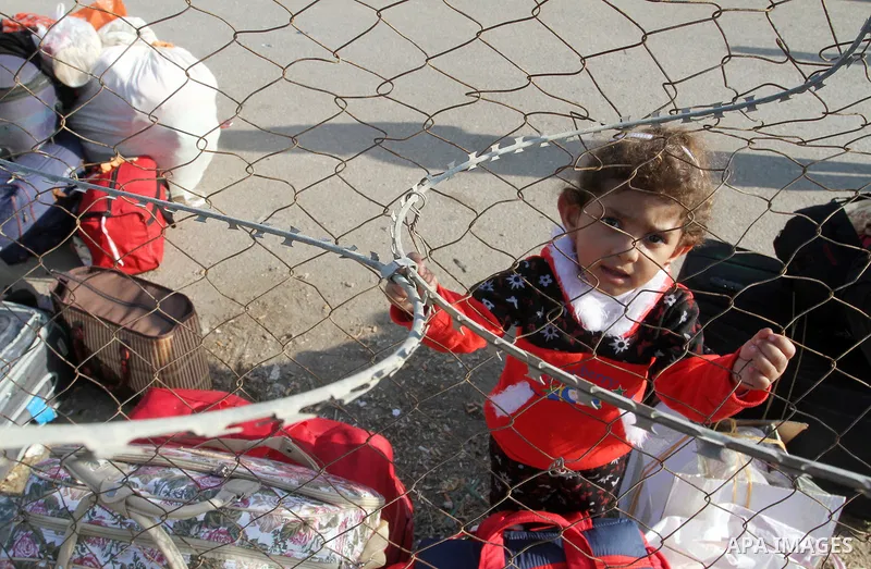 Palestinians wait permission to enter Egypt as they gather at the Rafah border crossing in the southern Gaza Strip on on November 14, 2016. Egypt is due to reopen its Rafah border crossing with Gaza for Five days. Photo...