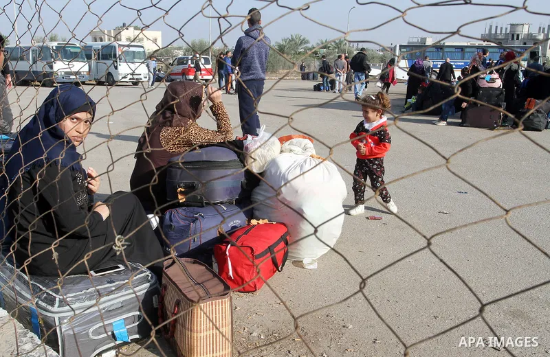 Palestinians wait permission to enter Egypt as they gather at the Rafah border crossing in the southern Gaza Strip on on November 14, 2016. Egypt is due to reopen its Rafah border crossing with Gaza for Five days. Photo...