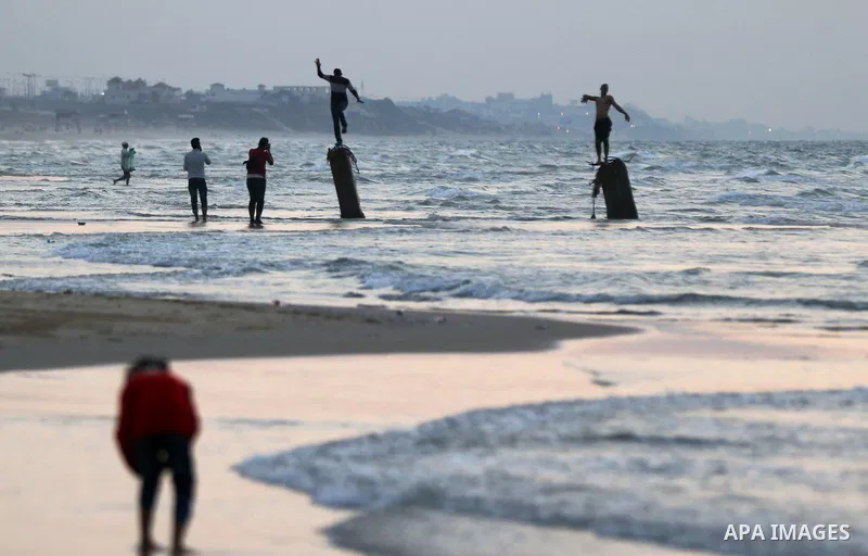 Palestinians enjoy their time off the beach of Gaza City on November 14, 2016. Photo by Yasser Qudih