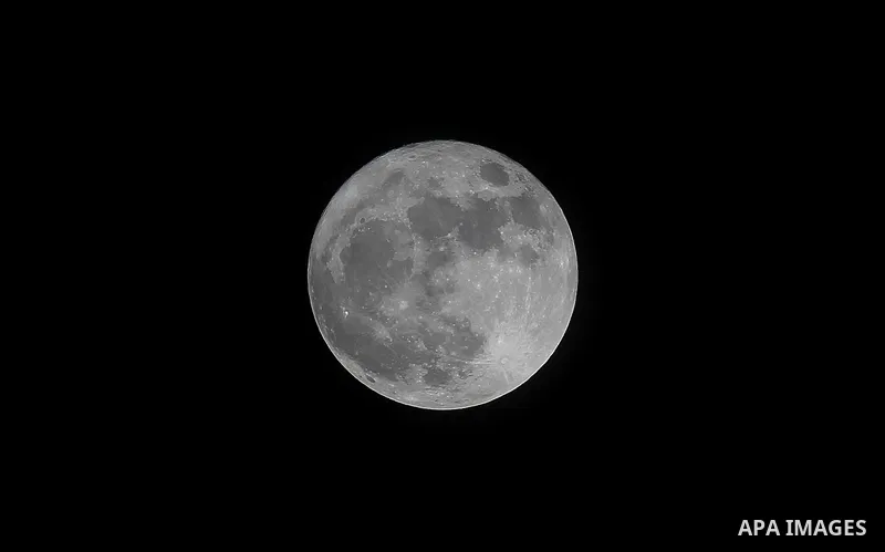 The 'Supermoon' rises over the West Bank city of Hebron on November 14, 2016. The moon will be the closest to Earth since 1948 at a distance of 356,509 kilometres (221,524 miles), creating what NASA described as "an extr...