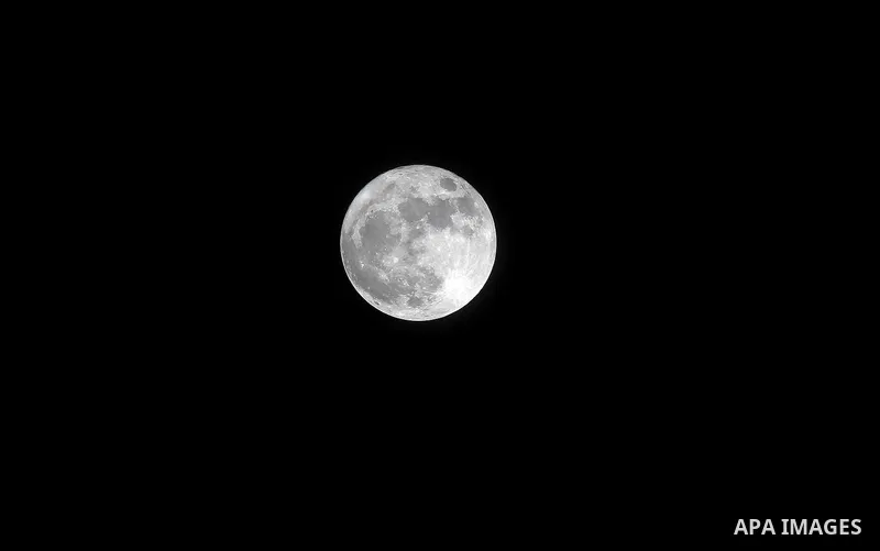 The 'Supermoon' rises over the West Bank city of Hebron on November 14, 2016. The moon will be the closest to Earth since 1948 at a distance of 356,509 kilometres (221,524 miles), creating what NASA described as "an extr...
