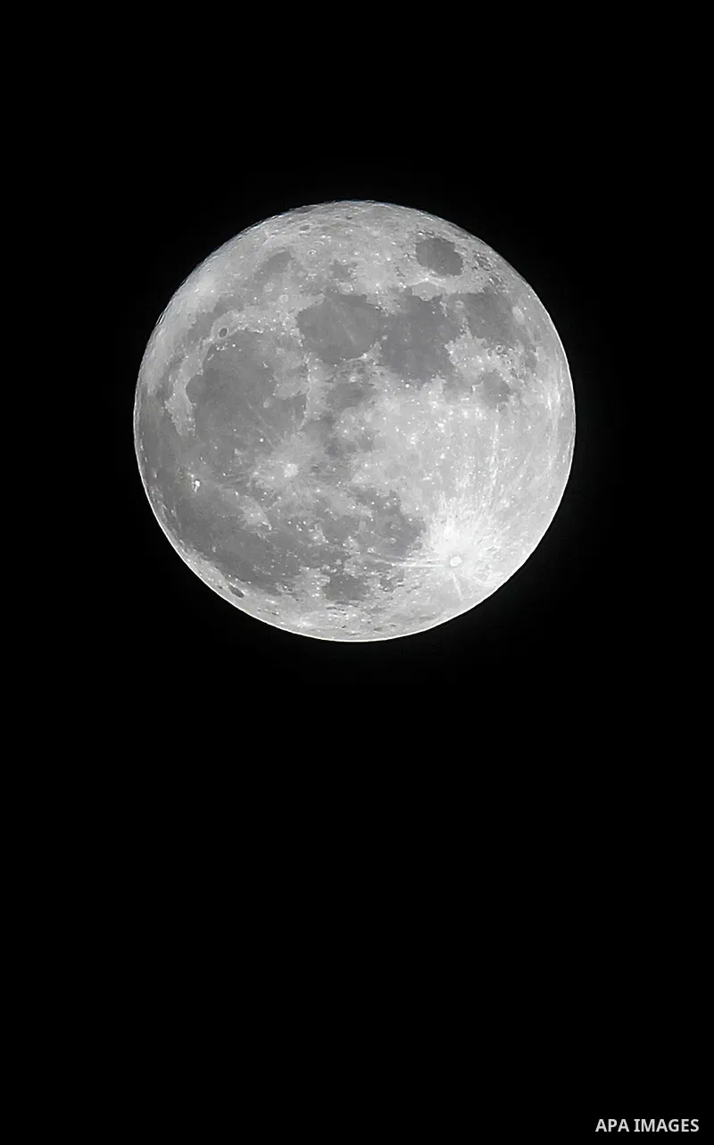 The 'Supermoon' rises over the West Bank city of Hebron on November 14, 2016. The moon will be the closest to Earth since 1948 at a distance of 356,509 kilometres (221,524 miles), creating what NASA described as "an extr...