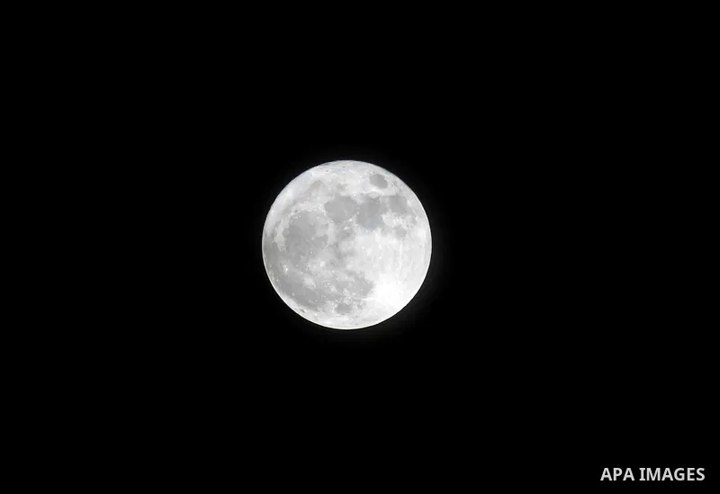 The 'Supermoon' rises over the West Bank city of Hebron on November 14, 2016. The moon will be the closest to Earth since 1948 at a distance of 356,509 kilometres (221,524 miles), creating what NASA described as "an extr...
