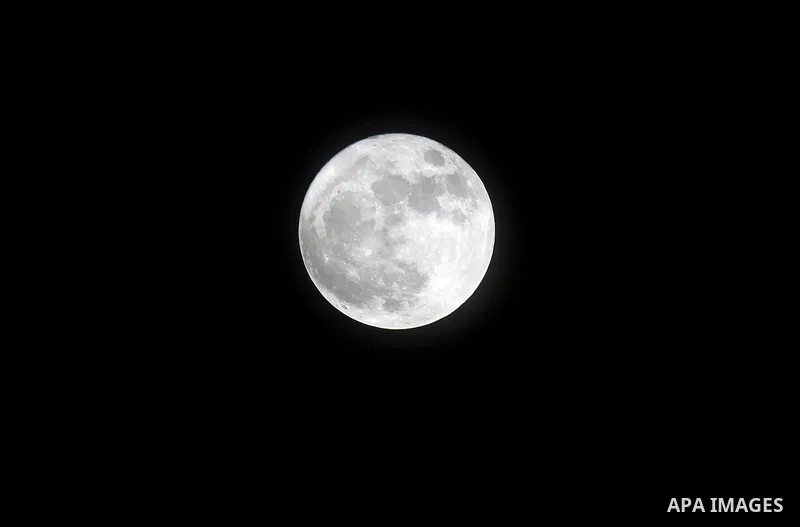 The 'Supermoon' rises over the West Bank city of Hebron on November 14, 2016. The moon will be the closest to Earth since 1948 at a distance of 356,509 kilometres (221,524 miles), creating what NASA described as "an extr...