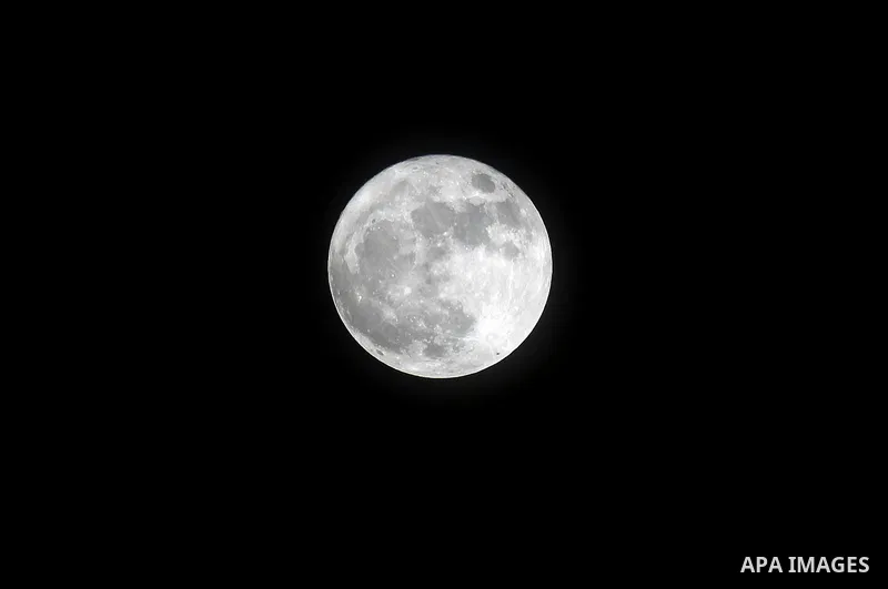 The 'Supermoon' rises over the West Bank city of Hebron on November 14, 2016. The moon will be the closest to Earth since 1948 at a distance of 356,509 kilometres (221,524 miles), creating what NASA described as "an extr...