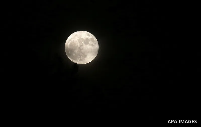The 'Supermoon' rises over Gaza city on November 14, 2016. The moon will be the closest to Earth since 1948 at a distance of 356,509 kilometres (221,524 miles), creating what NASA described as "an extra-supermoon". Photo...