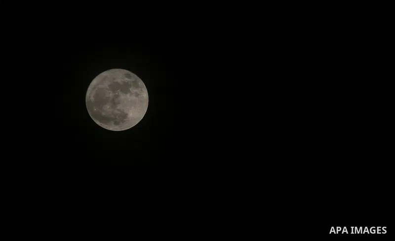 The 'Supermoon' rises over Gaza city on November 14, 2016. The moon will be the closest to Earth since 1948 at a distance of 356,509 kilometres (221,524 miles), creating what NASA described as "an extra-supermoon". Photo...