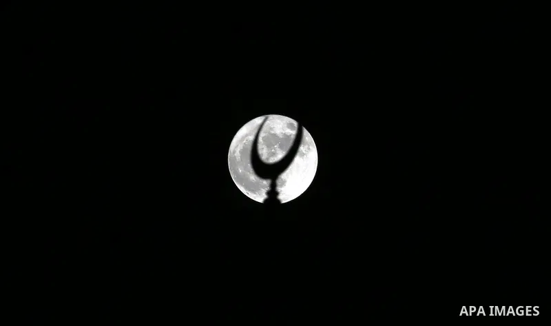 The 'Supermoon' rises over Gaza city on November 14, 2016. The moon will be the closest to Earth since 1948 at a distance of 356,509 kilometres (221,524 miles), creating what NASA described as "an extra-supermoon". Photo...