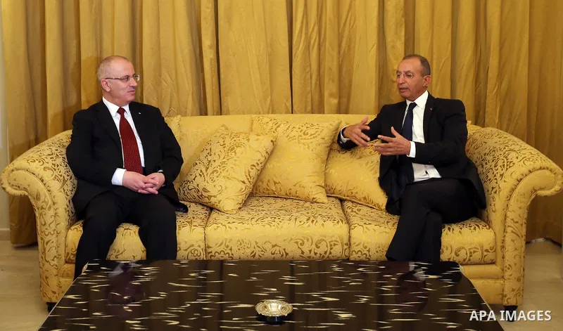 Palestinian Prime Minister, Rami Hamdallah, meet with Moroccan Interior Minister Mohamed Hassad in Marrakesh, on November 14, 2016. Photo by Prime Minister Office