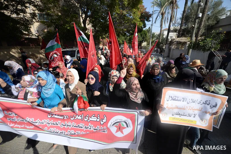Palestinian supporters of the Popular Front for the Liberation of Palestine (PFLP) take part in a protest marking the national day of independence, in Gaza City on November 15, 2016. Photo by Hassan Jedi
