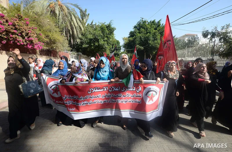 Palestinian supporters of the Popular Front for the Liberation of Palestine (PFLP) take part in a protest marking the national day of independence, in Gaza City on November 15, 2016. Photo by Hassan Jedi