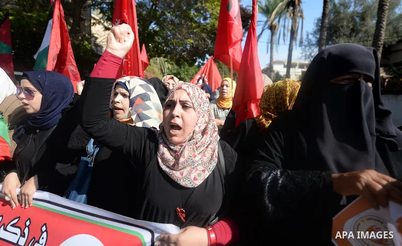 Palestinian supporters of the Popular Front for the Liberation of Palestine (PFLP) take part in a protest marking the national day of independence, in Gaza City on November 15, 2016. Photo by Hassan Jedi