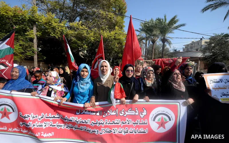 Palestinian supporters of the Popular Front for the Liberation of Palestine (PFLP) take part in a protest marking the national day of independence, in Gaza City on November 15, 2016. Photo by Hassan Jedi